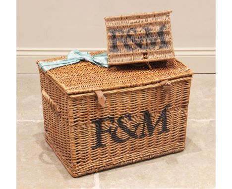 A Fortnum &amp; Mason wicker hamper basket, the hinged cover with buckled leather fastening straps above side loop handles, 3