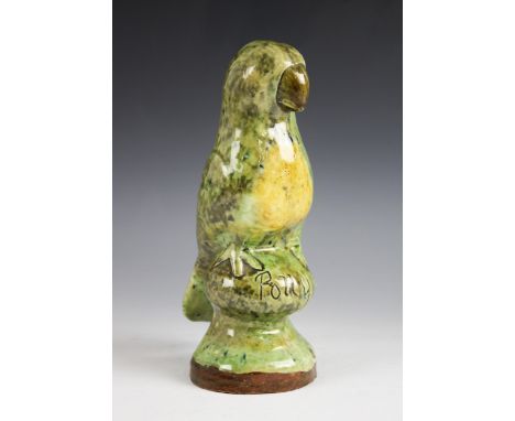 A Welsh Ewenny Pottery glazed terracotta model of a parrot by Evan Jones, late 19th or early 20th century, glazed in mottled 