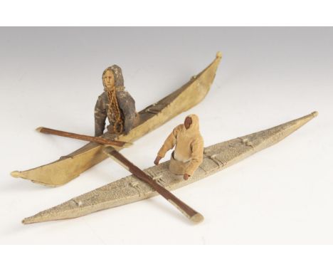A shagreen and bone mounted model of an Inuit figure in a canoe or kayak, 39.5cm long, with a similar model of an Inuit figur