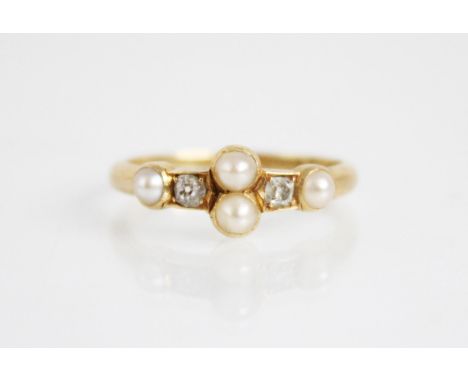 A Victorian pearl and diamond 18ct gold ring, possibly Alabaster & Wilson, the two central pearls measuring approximately 3.3