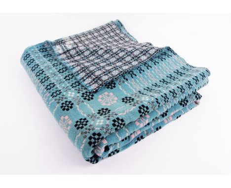 A Welsh blanket, of unusual reversible geometric design in turquoise, black, pink and white, unfringed, 168cm x 191cm CONDITI