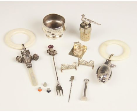 A selection of silver and silver coloured accessories, to include a novelty silver rattle, Crisford & Norris Ltd, Birmingham 