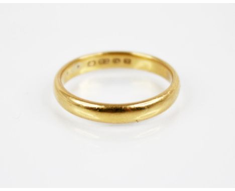 A George V 22ct gold wedding band, marks for Birmingham 1923, ring size P, weight 3.9gmsCR; Light denting, heavy scratching a