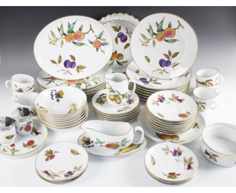 A Royal Worcester part service in the "Evesham" pattern, comprising; seven oval dinner plates, 30cm wide, seven circular dinn