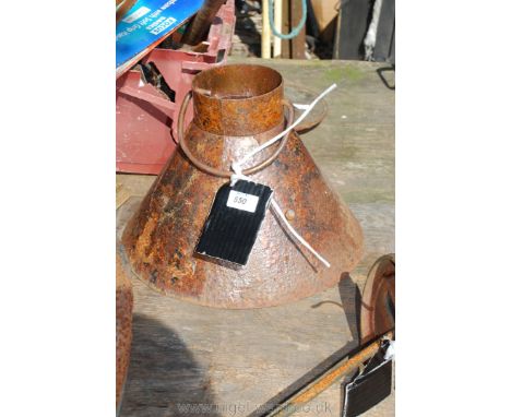 A metal hood lamp.