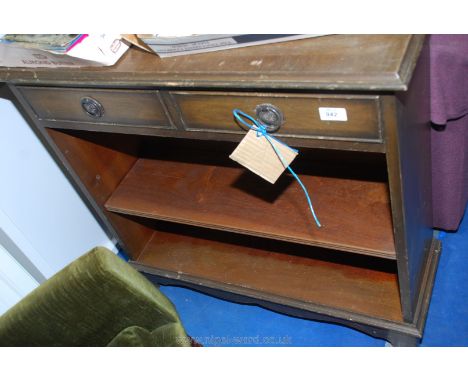 A two drawer, two shelf wooden unit.