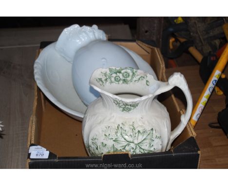 A wash jug and basin plus another wash jug.