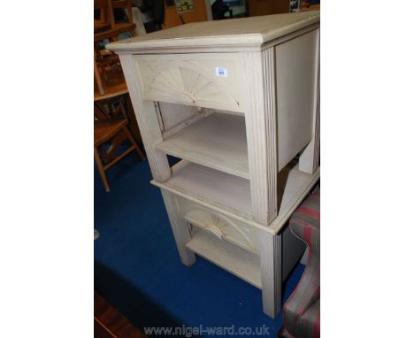 A pair of modern one drawer bedside cabinets with shelf.