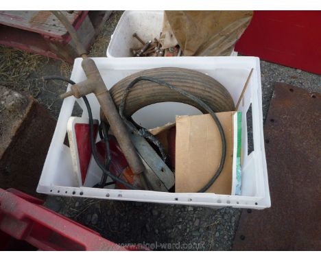 A brass pump, rear light fittings, tyre etc