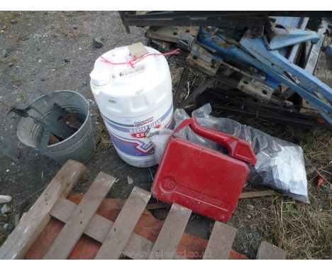 Two bags of plaster bases, drum of water, clean extra plastic, weather vane, galvanised bucket etc. 
