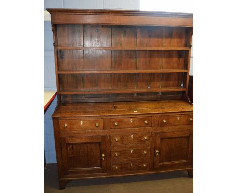 18th century and later oak dresser, plate rack back over base fitted with six drawers and two cupboards on bracket feet, 1.66