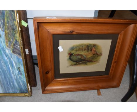 A print of two Pheasants, mounted and in pine frame.