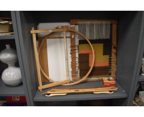 A weavers loom and similar wool working tools