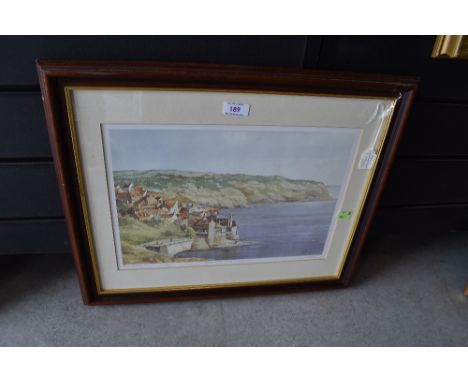 A signed and limited edition print after KW Burton depicting Robin hoods bay.