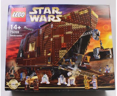 A Lego No. 75059 boxed Sandcrawler Lego construction kit housed in the original box, box has been opened but contents still s