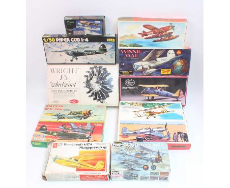 A group of 12 various manufacturers in various scales, including a Williams Bros Wright J5 Whirlwind scale model engine plast