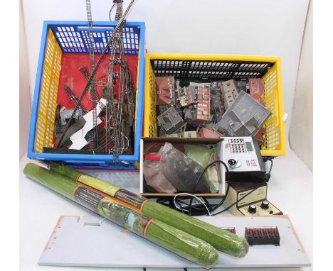 Two boxes containing a quantity of various track digital controllers, layout card buildings, all as removed from ex-railway l