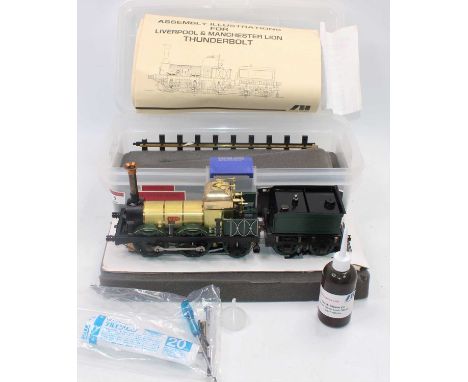 An Aster live steam model of a Lion 0-4-2 Liverpool &amp; Manchester Thunderbolt locomotive and tender, finished in green wit