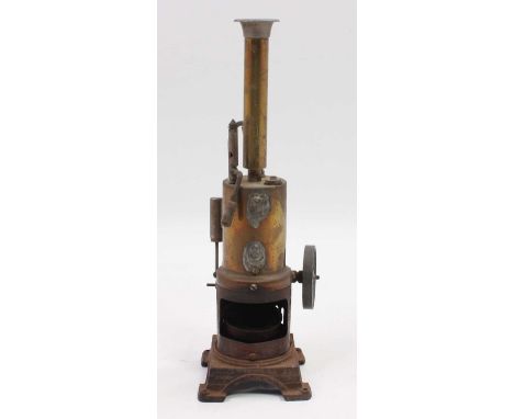 A stationary vertical steam engine, possibly German, comprising copper housed boiler with single oscillating cylinder engine 
