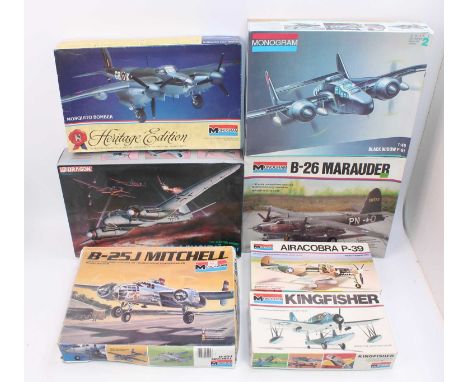 A group of 7 plastic aircraft kits in 1:48th scale by various makers including, Monogram x 6 and 1 Dragon Ju 88 G-6, all seem