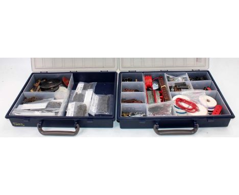 Two plastic trays containing a quantity of Meccano 1950s and Elektrikit components, to include various chain lengths, cogs, p