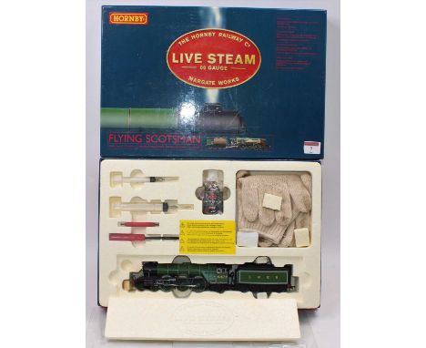 A Hornby Railways live steam 00 gauge No. R2485 live steam Flying Scotsman locomotive and tender, housed in the original poly