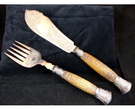 Set of hallmarked silver fish servers with decorative ceramic handles and foliate design. Assay Sheffield 1888