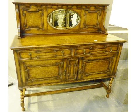 Oak mirror back sideboard with two drawers over cupboards on barley twist supports. H: 134 cm L: 127 cm