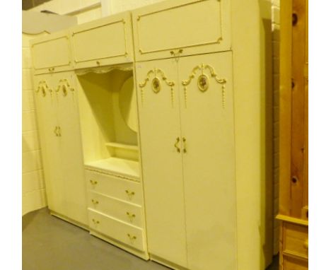 Cream triple wardrobe with central circular mirror and three drawers
