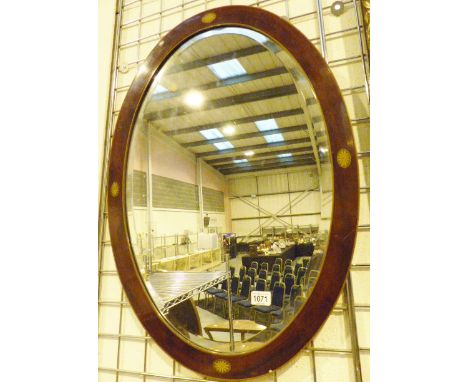Oval inlaid wood framed bevelled edge mirror. 170 x 50 cm