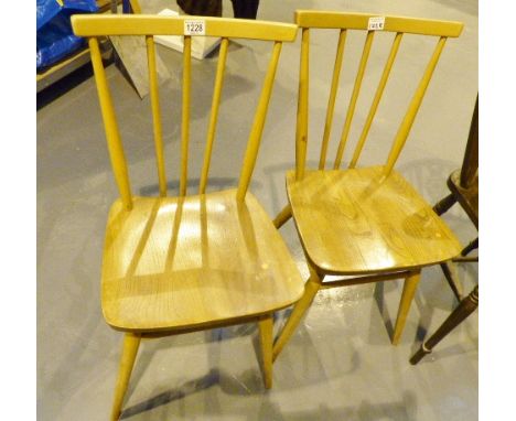 Pair of light oak stickback Ercol dining chairs 