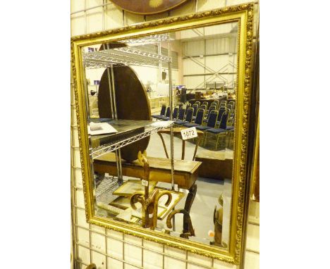 Gilt framed bevelled edged mirror. 35 x 50 cm