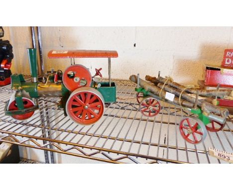 Old Smoky tin model steam roller and wagon with steering, marked Made in Western Germany. L: 67 cm