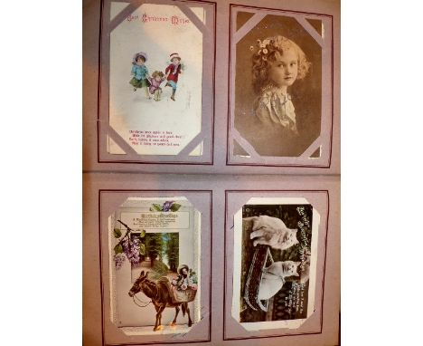 Album of approx 120 vintage greetings and post cards
