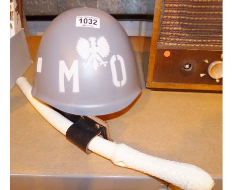 Modern military Polish? helmet and rubber truncheon