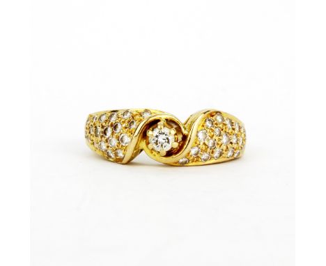 A heavy 18ct yellow gold (stamped 18K) diamond set ring, (N).