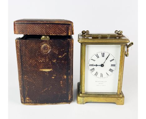 A Benetfink &amp; Co French brass carriage clock, H. 14.5cm. Top glass replaced with perspex. With carrying case.