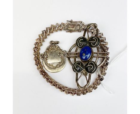 A silver stone set bracelet, Art Nouveau design brooch and fob.