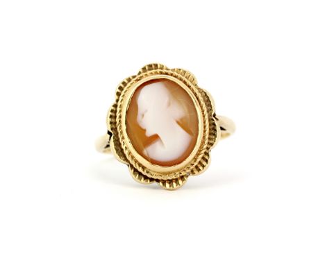 A hallmarked 9ct yellow gold cameo ring, (L). Slight bend to shank.