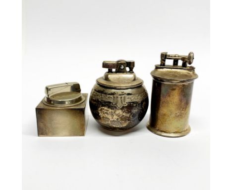 A hallmarked silver 'witchball' table lighter with a hallmarked silver engine turned table lighter and a further 925 silver '