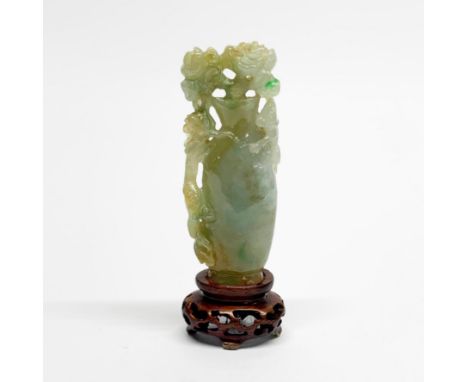 A fine Chinese carved jade model of a vase with dragon and monkey reaching for flowers, overall H. 9cm.