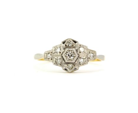 An Art Deco 18ct gold and platinum diamond set ring, (S).