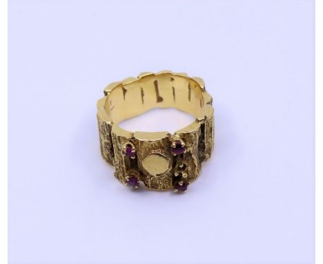 A 1970s heavy textured ring mounted with Ruby&nbsp;