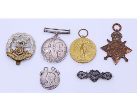 WWI medals 'Great war', a Hampshire regiment cap badges, stick pin, crown etc