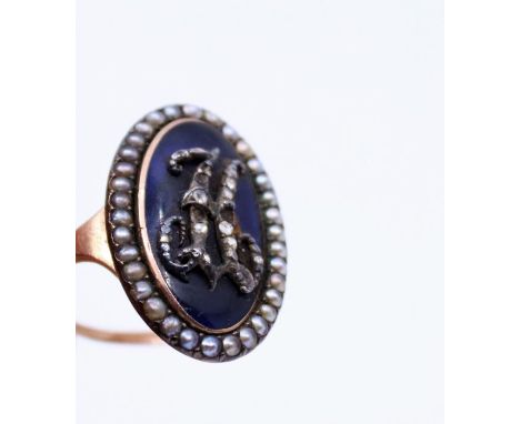 A late Georgian blue enamel Mourning ring of navette form encrusted with old cut diamonds