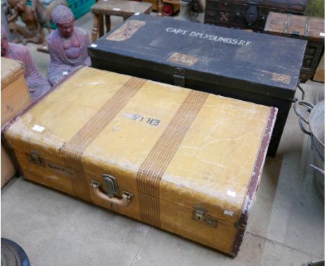 A vintage suitcase and a military trunk 