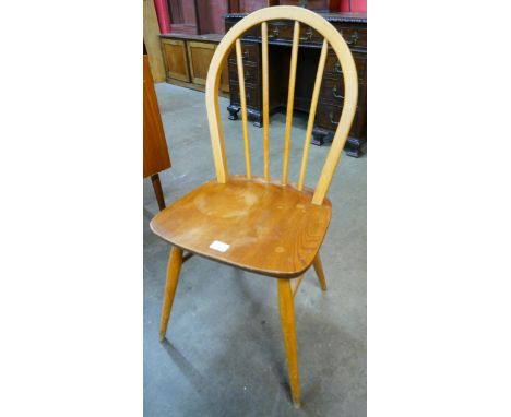 An Ercol Blonde elm and beech Windsor chair 