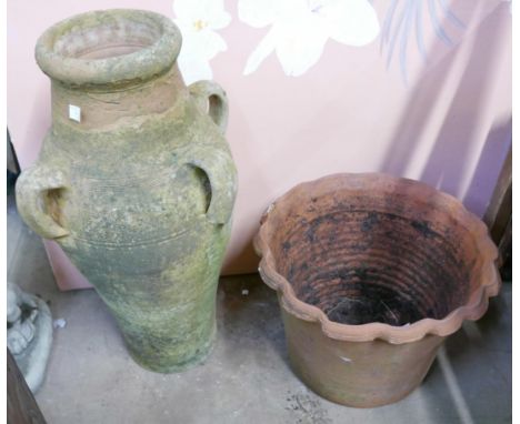 A terracotta planter and a jug 