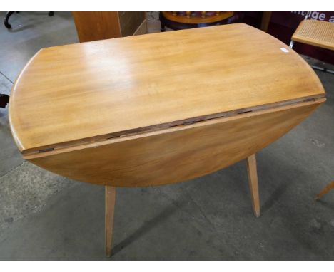 An Ercol Blonde elm and beech Windsor drop-leaf table 