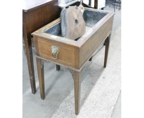 A Victorian planter and a pair of bellows 